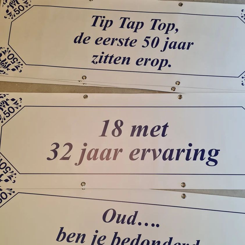 spandoek met tekst

